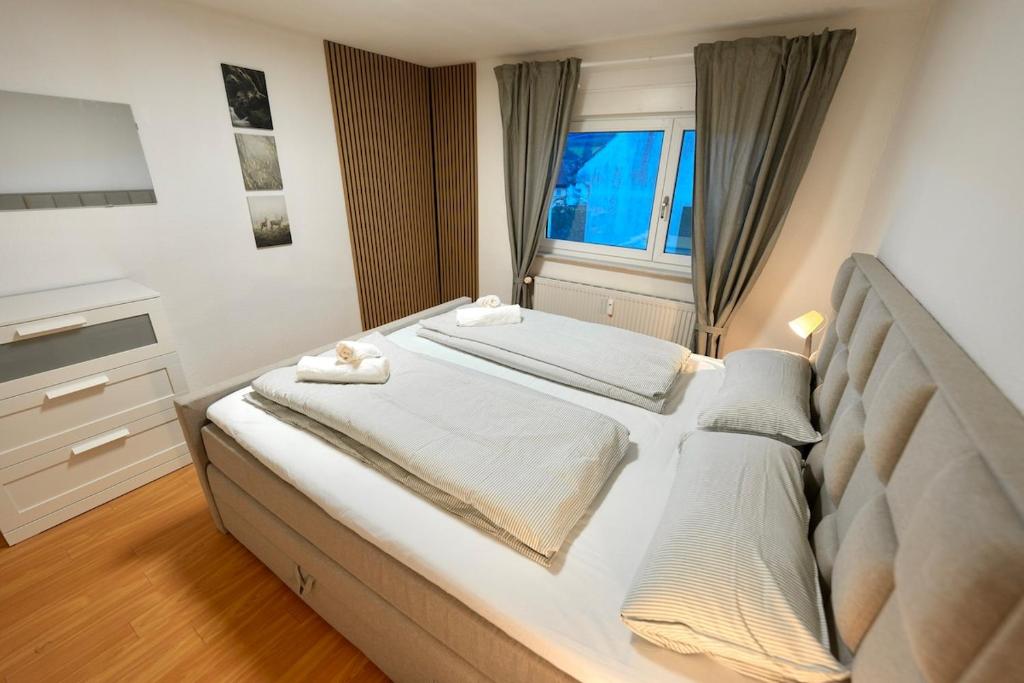 Ένα ή περισσότερα κρεβάτια σε δωμάτιο στο Ferienwohnung Paula