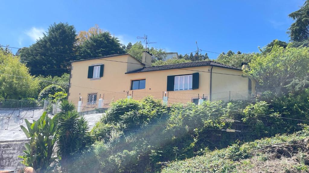 a house sitting on top of a hill at CASA da LINHA in Caminha