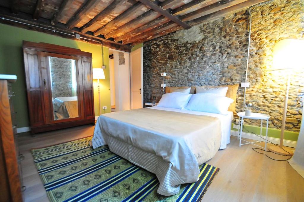 Ένα ή περισσότερα κρεβάτια σε δωμάτιο στο Villa Querceta 2Min Von Forte Dei Marmi