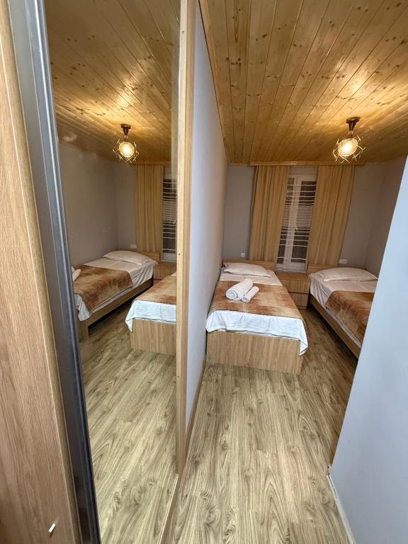 Postel nebo postele na pokoji v ubytování guesthouse twins in svaneti