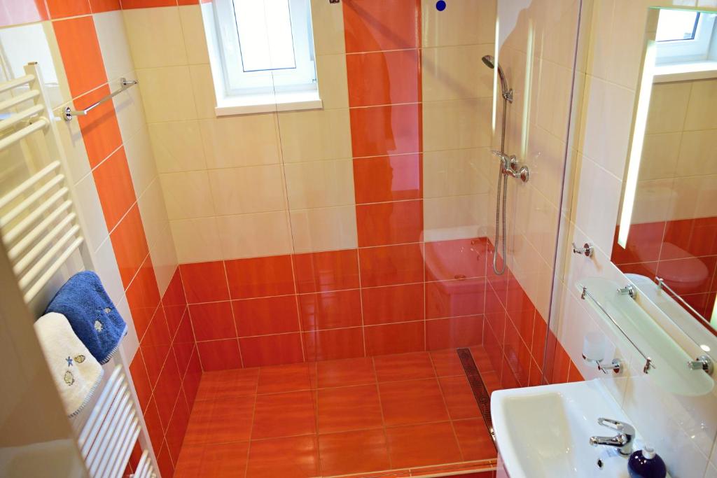 A bathroom at Apartmány Lenko - near thermal aquapark Tatralandia