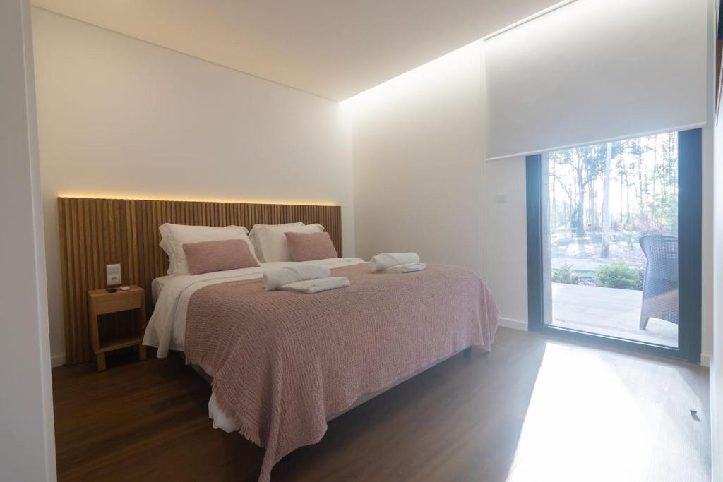 Postel nebo postele na pokoji v ubytování Retiro Na Montanha Country House - Ponte De Lima