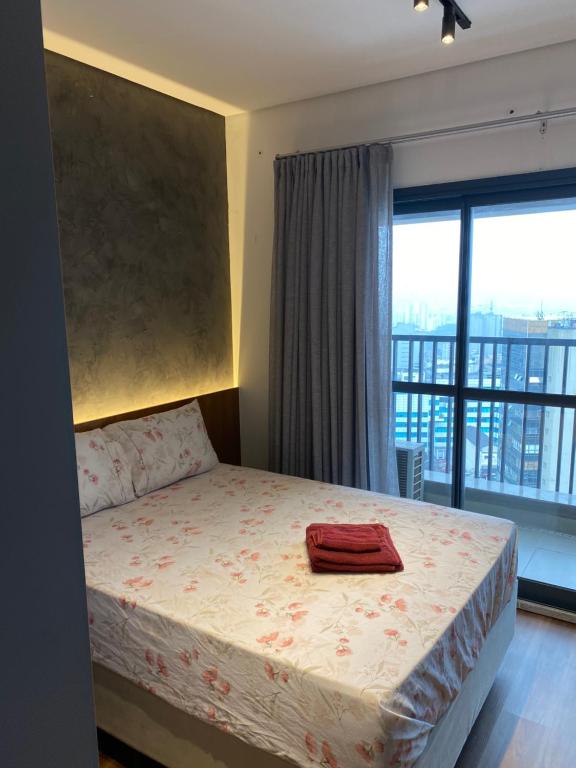 Ένα ή περισσότερα κρεβάτια σε δωμάτιο στο Apartamento na Liberdade a 300 metros do Metro e Feirinha da Liberdade