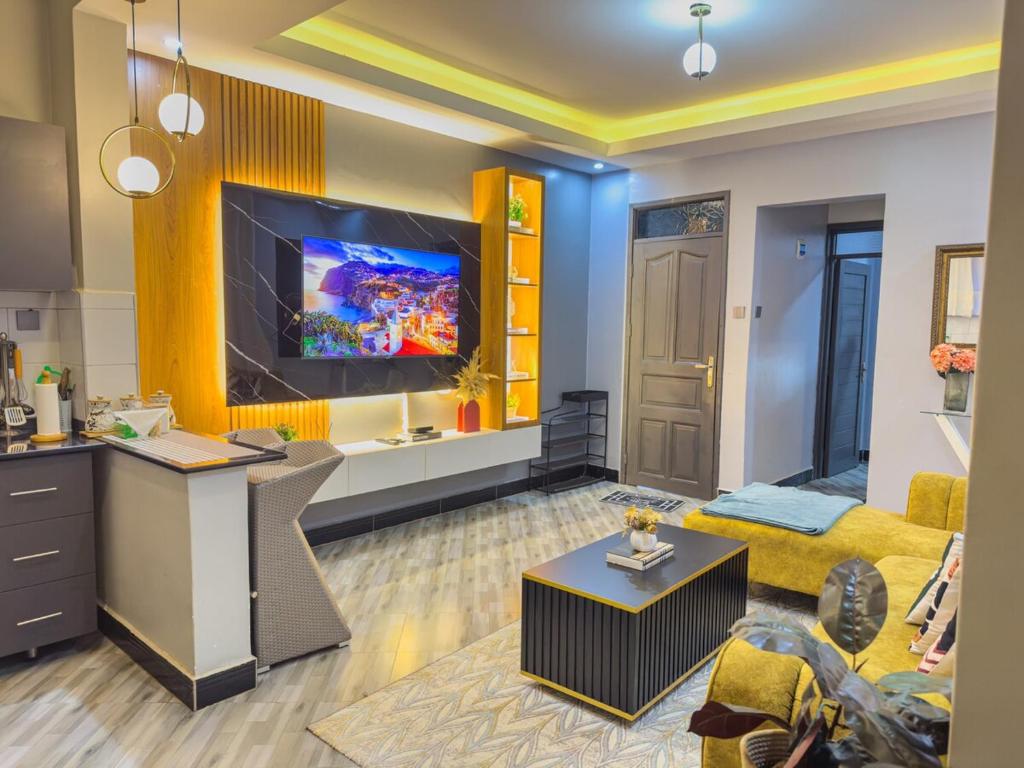 Μια τηλεόραση ή/και κέντρο ψυχαγωγίας στο Serene Abodes MB1