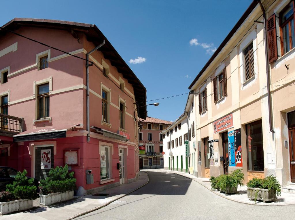 a city street with buildings and a building at Apartment Soca Tolmin in Tolmin