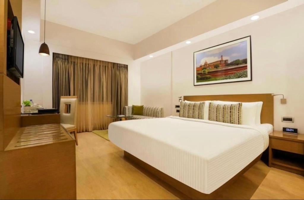 Hotel Red Plaza -Near Delhi Airport & Free Airport Drop房間的床