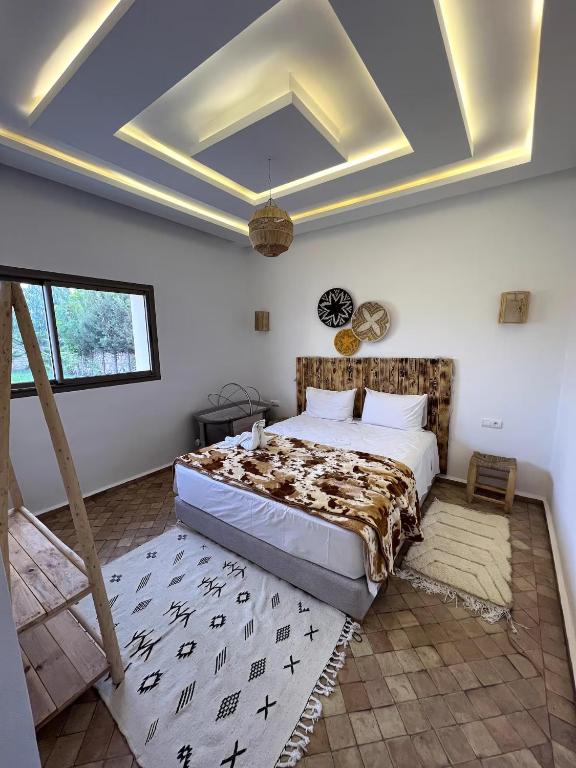 Ένα ή περισσότερα κρεβάτια σε δωμάτιο στο Igi wano guest house