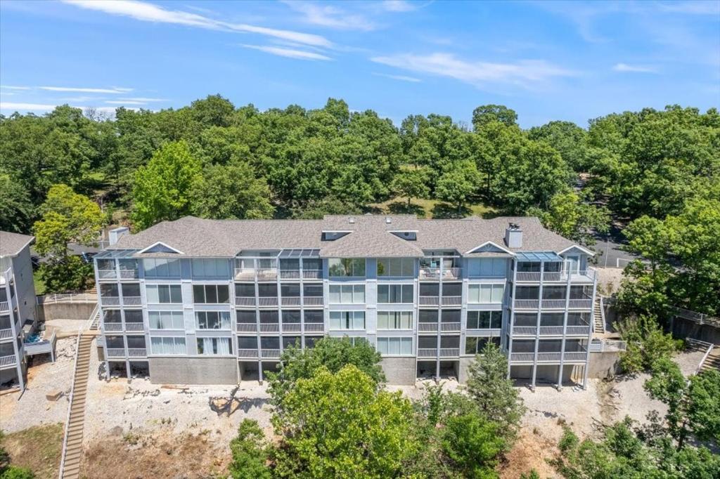 an aerial view of an apartment building at Games, Lake Views, Ease of Access to Unit & Attractions, Family-Friendly, Outdoor Comfort in Four Seasons