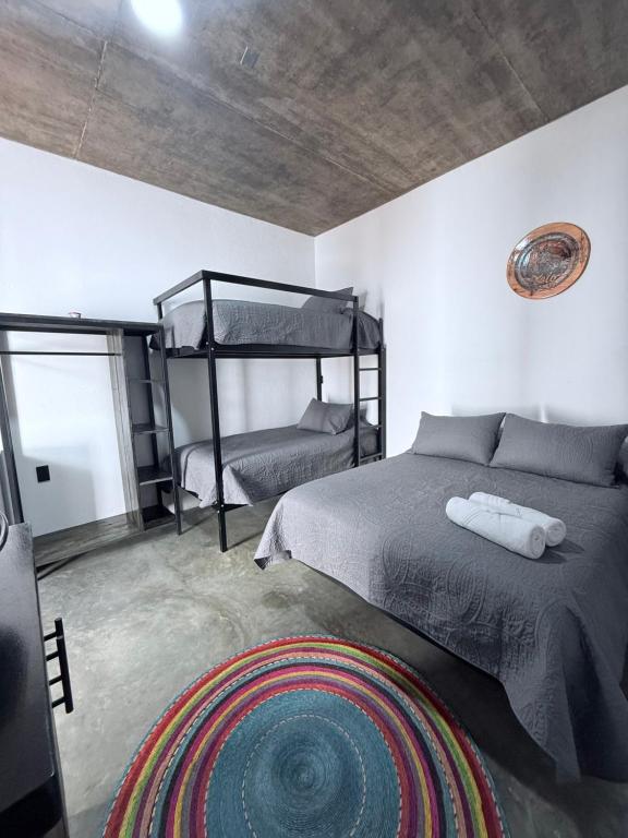 Postel nebo postele na pokoji v ubytování Casa Xolo Coco