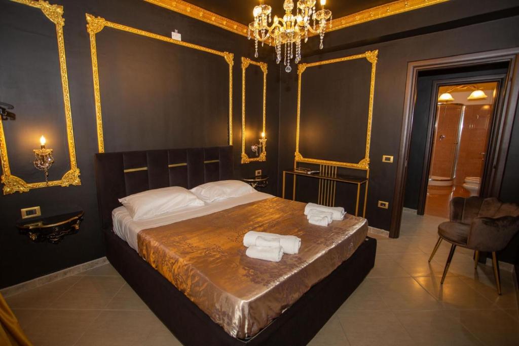 Ένα ή περισσότερα κρεβάτια σε δωμάτιο στο XVI Secolo House