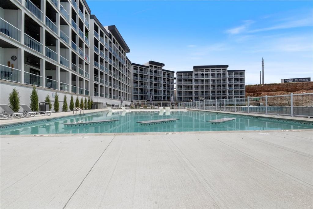 an empty swimming pool in the middle of a building at Upscale Lakeside Condo with Extraordinary Amenities at Topsider in Osage Beach 19mm in Laguna Beach