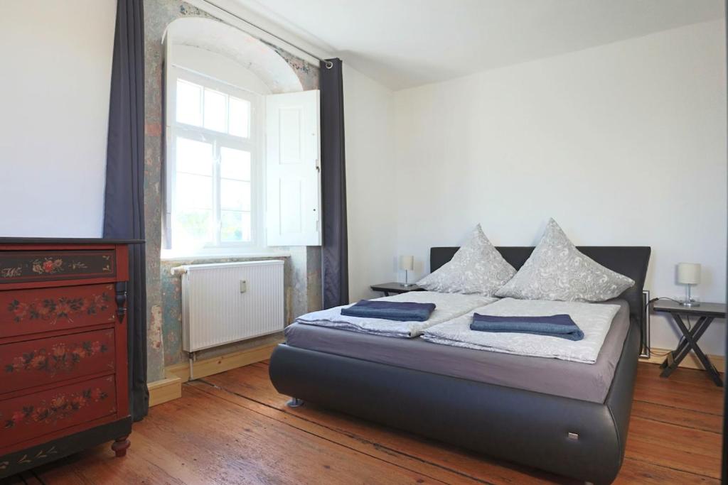 Katil atau katil-katil dalam bilik di Wachsmuts gemütliche Bleibe mir alter Wandmalerei