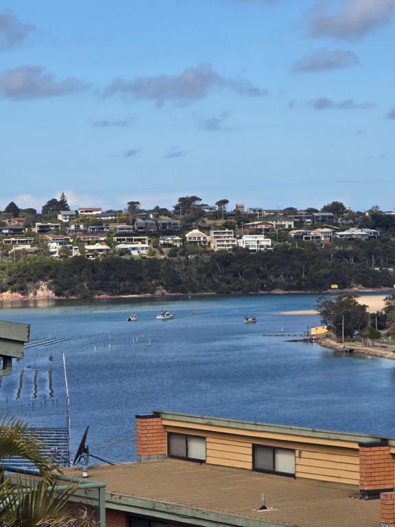 a view of a river with boats in it at 2 bedroom 2 level Apartment - Hydra Holiday Unit 6 in Merimbula