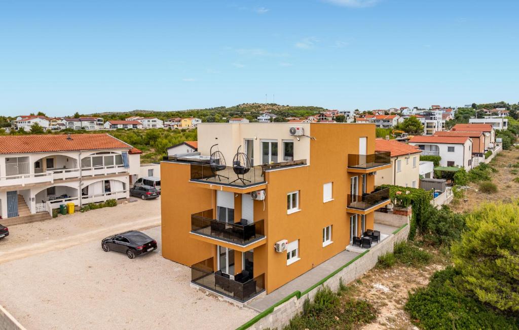 an aerial view of a building with a parking lot at Nice Apartment In Vir With Heated Swimming Pool in Pedinka