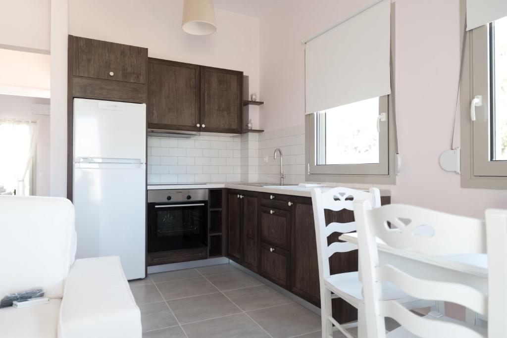 Kuchyň nebo kuchyňský kout v ubytování Elounda Sea Suites