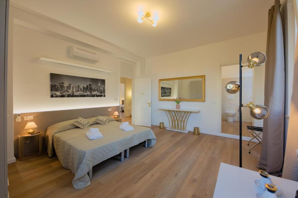 Ένα ή περισσότερα κρεβάτια σε δωμάτιο στο Camera Tokyo - La Casa di Carta Affittacamere