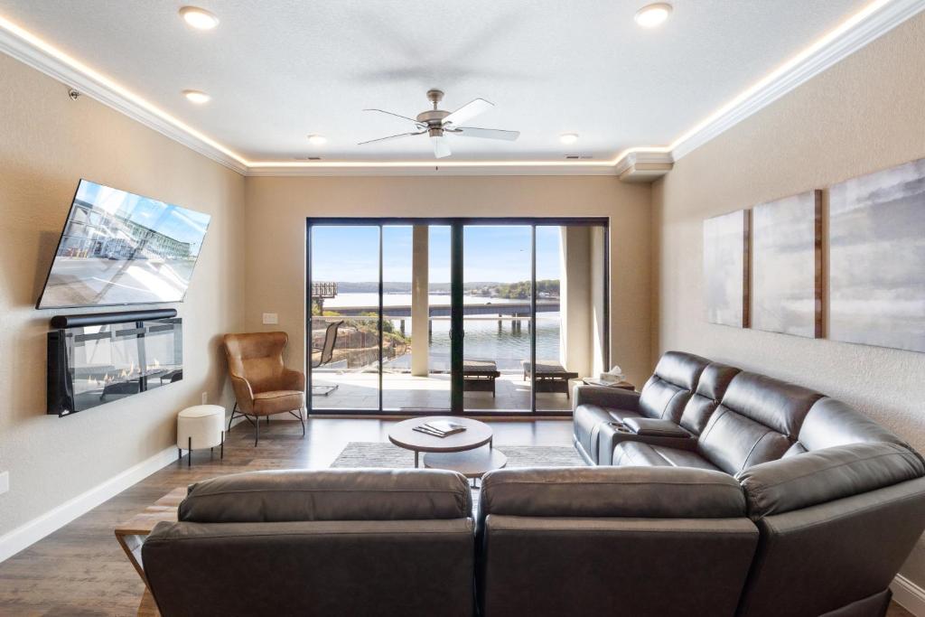 a living room with a couch and a table at Brand New Complex, Central Location, Amazing Views in Laguna Beach