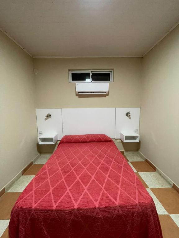 Ένα ή περισσότερα κρεβάτια σε δωμάτιο στο Hotel Don Luis