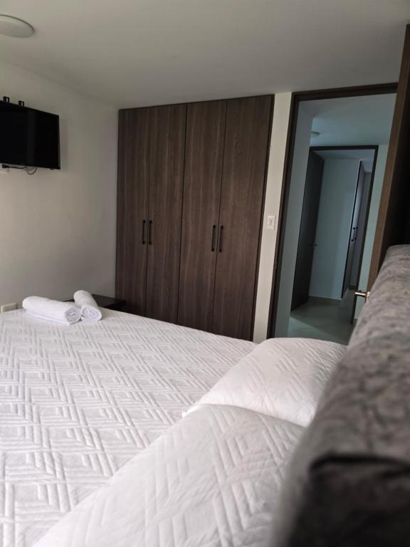 Ένα ή περισσότερα κρεβάτια σε δωμάτιο στο Posada Los Geranios