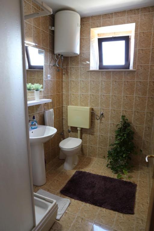 Łazienka w obiekcie Apartments Pržina