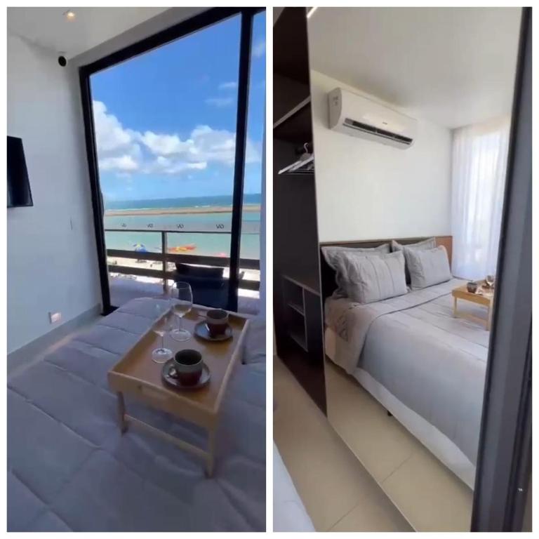une chambre avec un lit et une vue sur l'océan dans l'établissement Resort porto life2, à Ipojuca