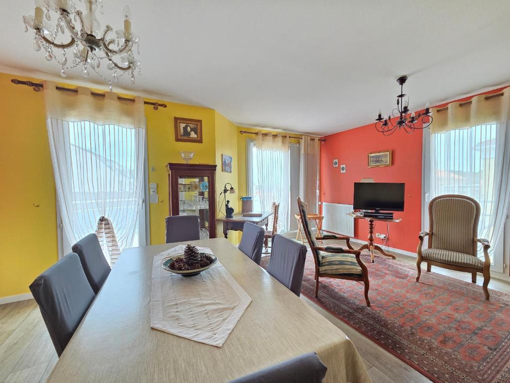 a dining room with a table and chairs at Appartement Tout Confort entre Plage et Commerces à Saint-Brevin-les-Pins - FR-1-364-55 in Saint-Brevin-les-Pins
