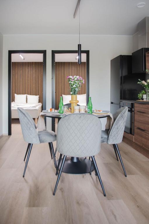a dining room with a table and chairs at Vario Hotel in Kokkola