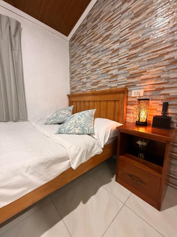 Ένα ή περισσότερα κρεβάτια σε δωμάτιο στο Sunny Terrace