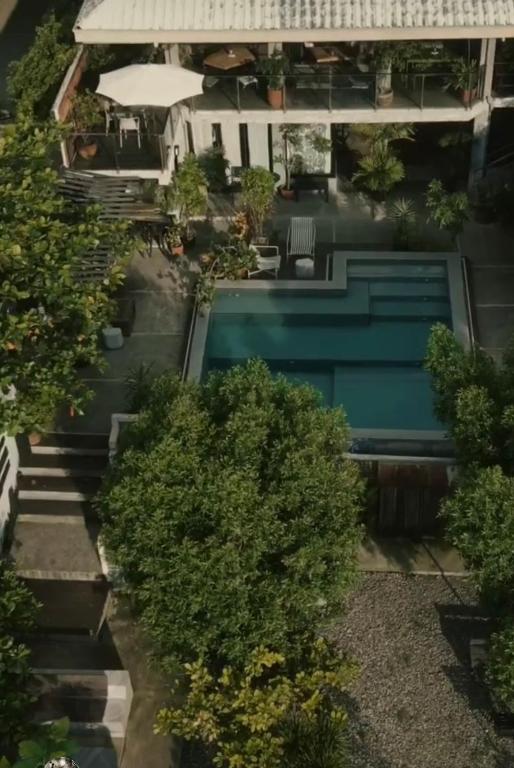 an aerial view of a house with a swimming pool at Eliseos Bed & Kitchen in San Juan