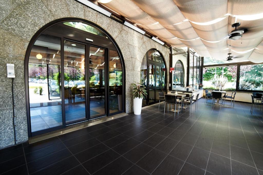 Un restaurante u otro lugar para comer en Hotel Giardino