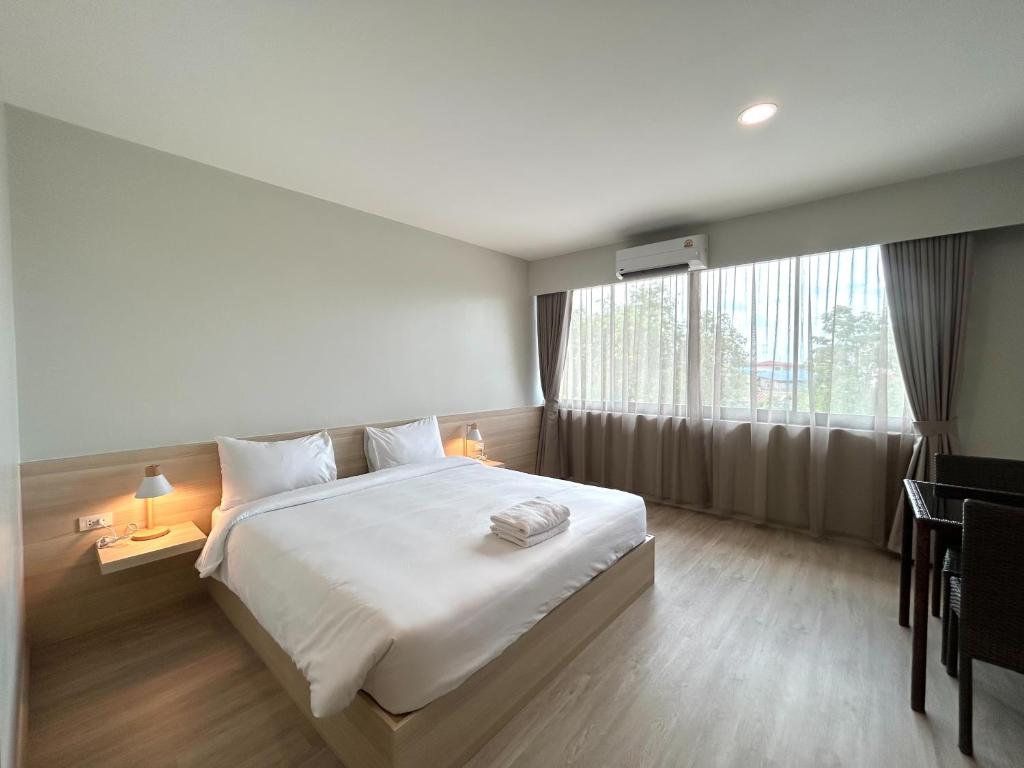 Postel nebo postele na pokoji v ubytování DD Boutique Resort