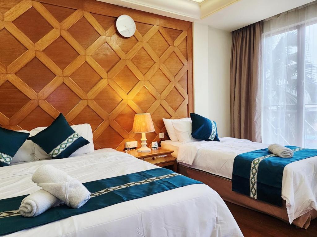 Postel nebo postele na pokoji v ubytování Langkawi Lagoon Resort hosted by Define Suite 4pax