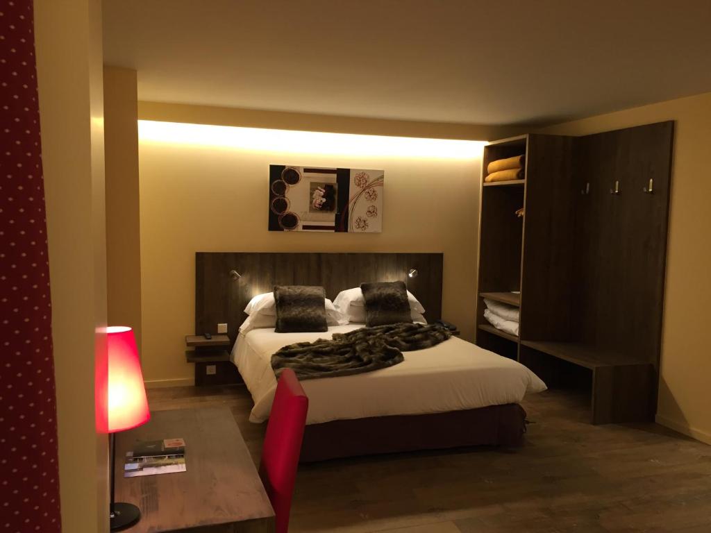 Postel nebo postele na pokoji v ubytování Hotel L’Ermita B&B