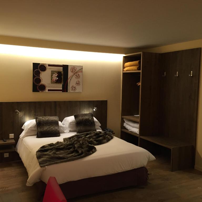 Postel nebo postele na pokoji v ubytování Hotel L’Ermita B&B