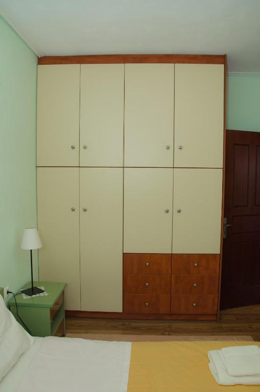 Postel nebo postele na pokoji v ubytování Nefeli