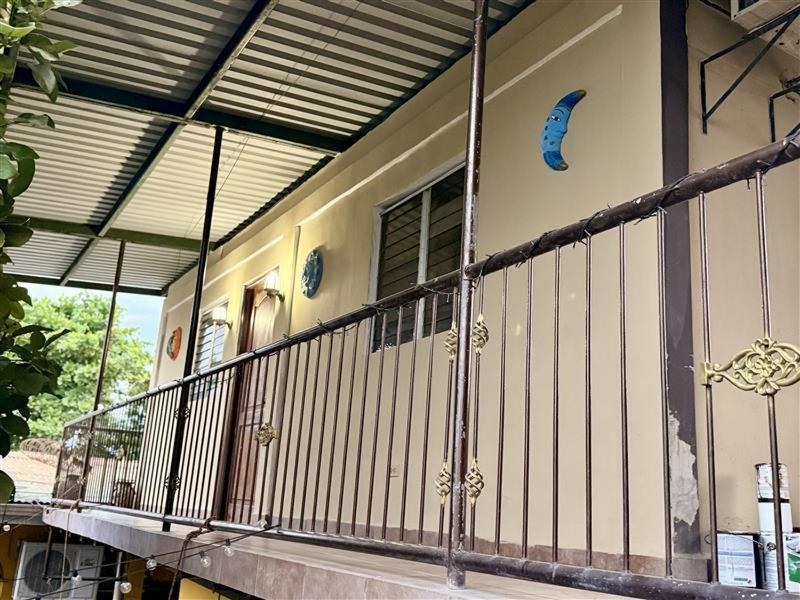 a balcony of a house with a fence at Apartamento - Casa Calderon, zona céntric in San Pedro Sula