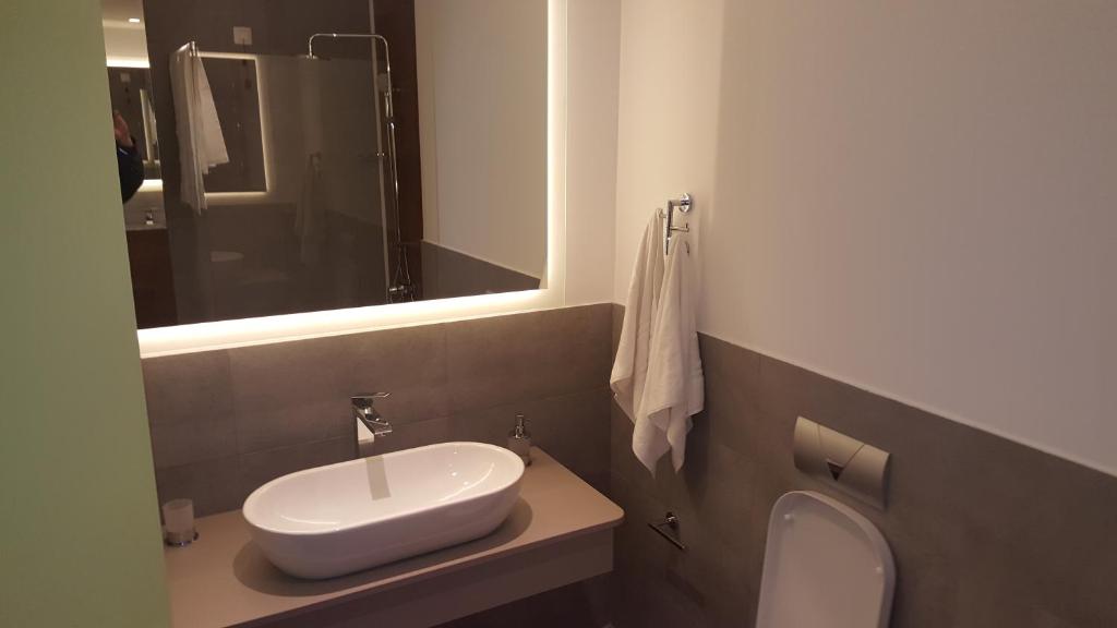 Koupelna v ubytování Hotel Grad