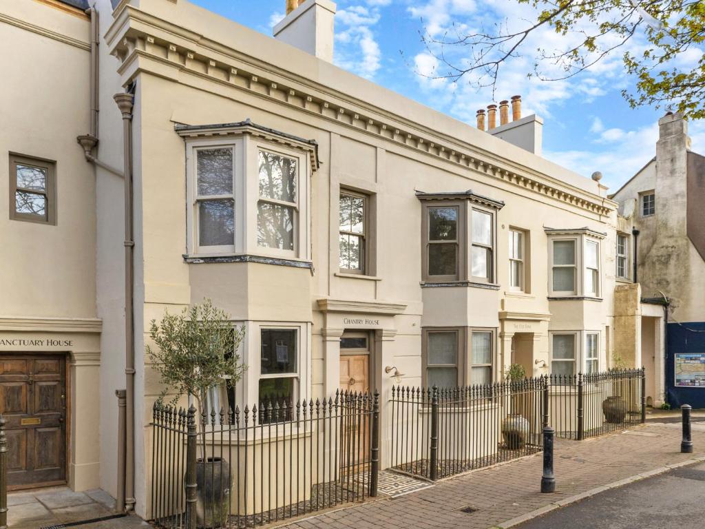 an image of a white house with a fence at Chantry House in Shoreham-by-Sea