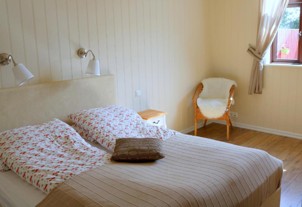 Letto o letti in una camera di Sólheimahjáleiga Guesthouse