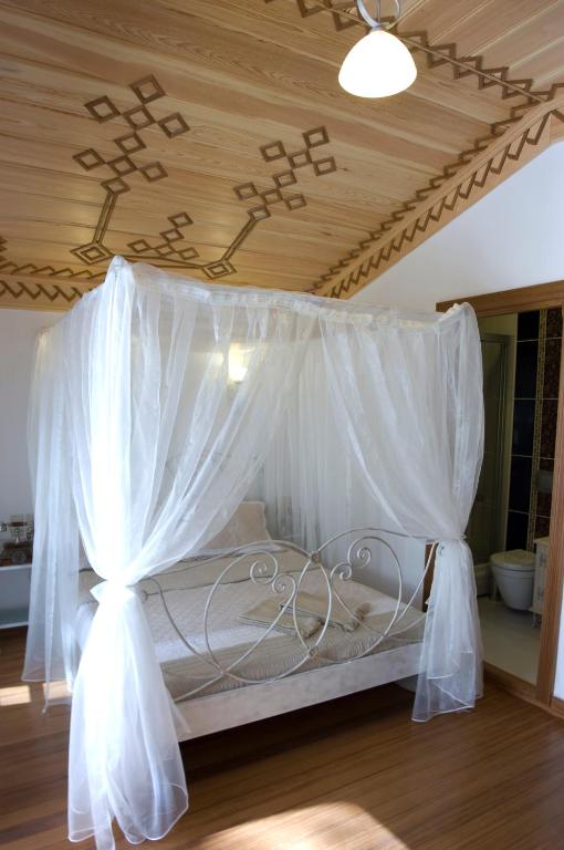 Postel nebo postele na pokoji v ubytování Hotel Des Etrangers - Special Category