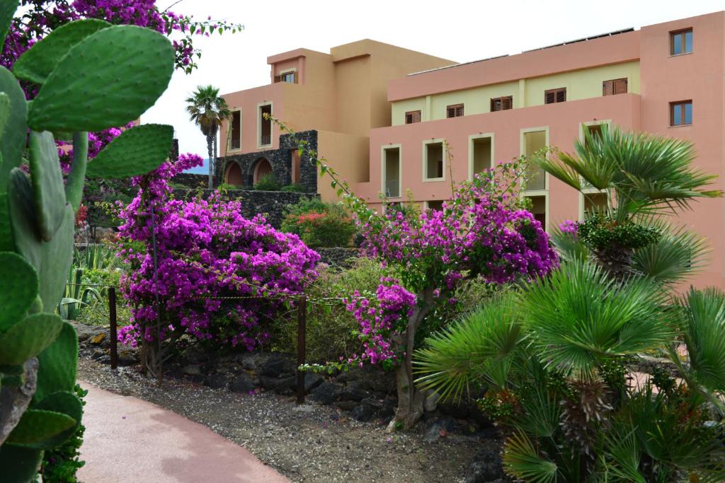 A garden outside Suvaki Resort