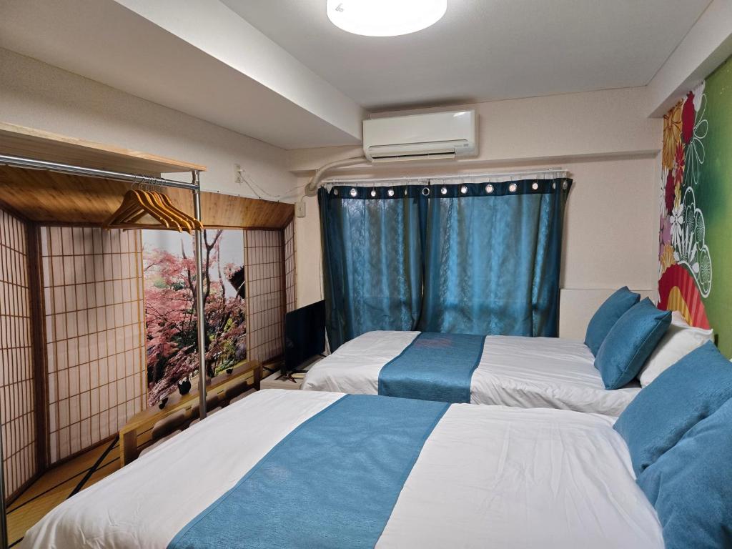 Ένα ή περισσότερα κρεβάτια σε δωμάτιο στο BandK Numabukuro 202