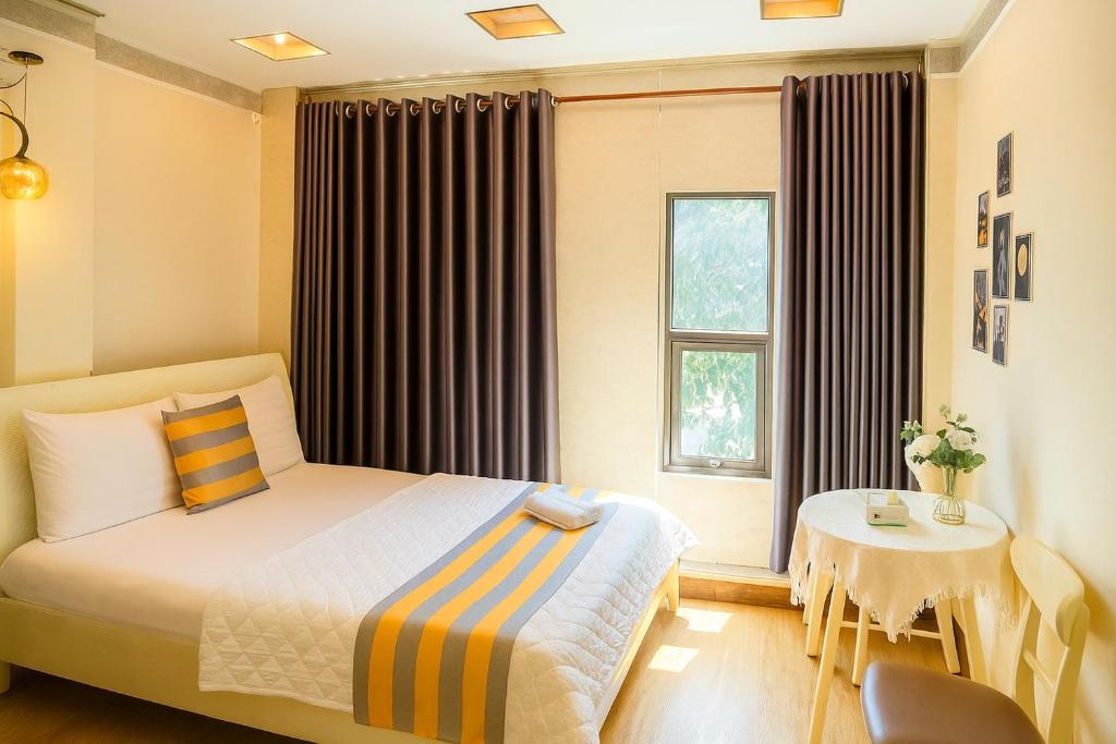 Ένα ή περισσότερα κρεβάτια σε δωμάτιο στο Jewel Hotel