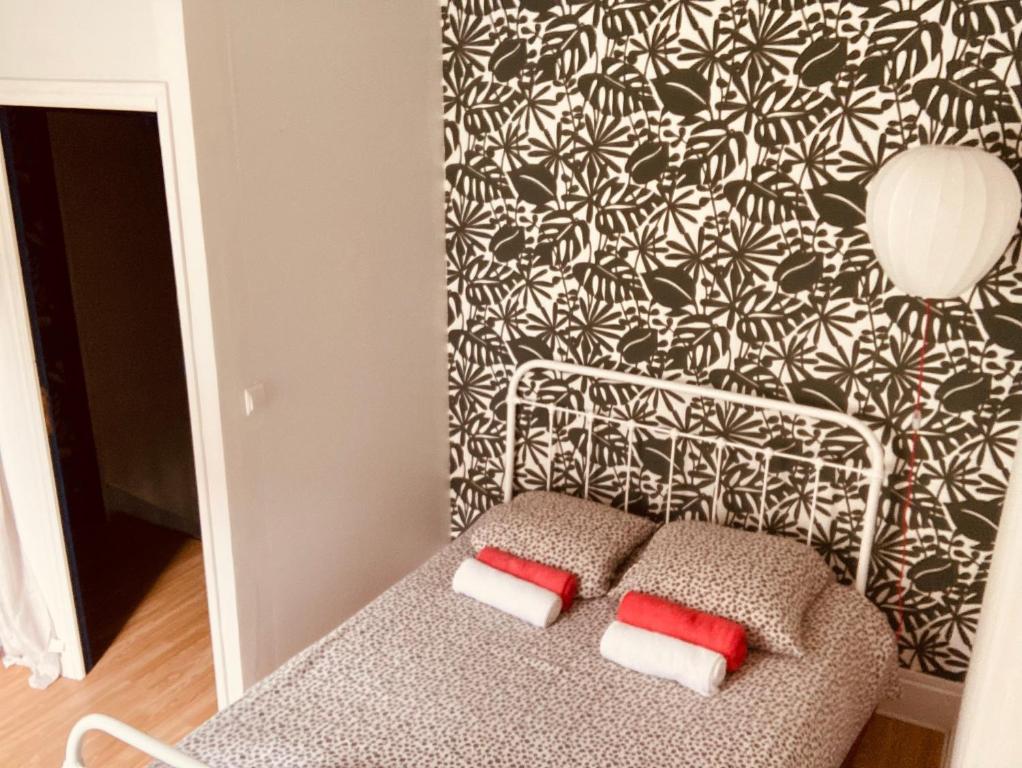 Postel nebo postele na pokoji v ubytování La petite Maison