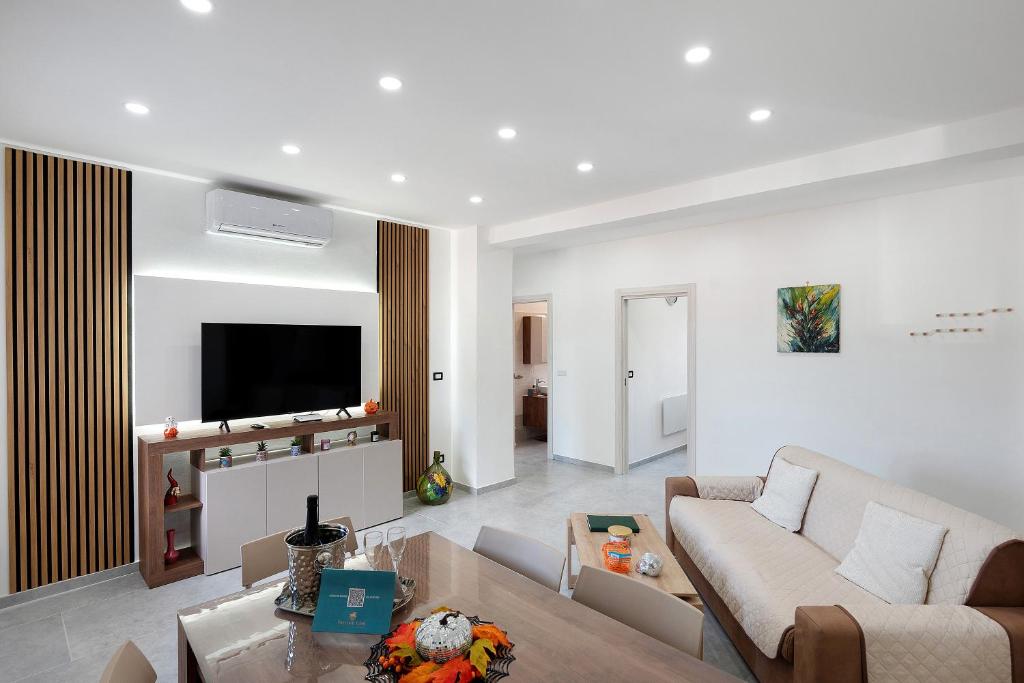 TV a/nebo společenská místnost v ubytování Paestum Eden