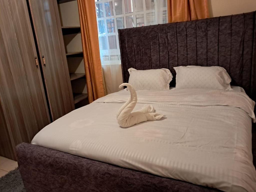 Postel nebo postele na pokoji v ubytování LnC bnb