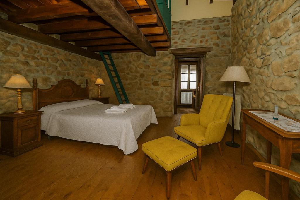 Ένα ή περισσότερα κρεβάτια σε δωμάτιο στο Casa Tenada