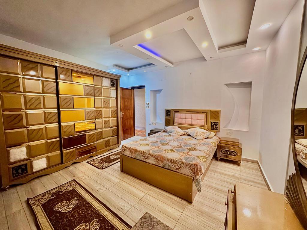 a bedroom with a bed in a room at Nile House in Maadi N4 in Cairo