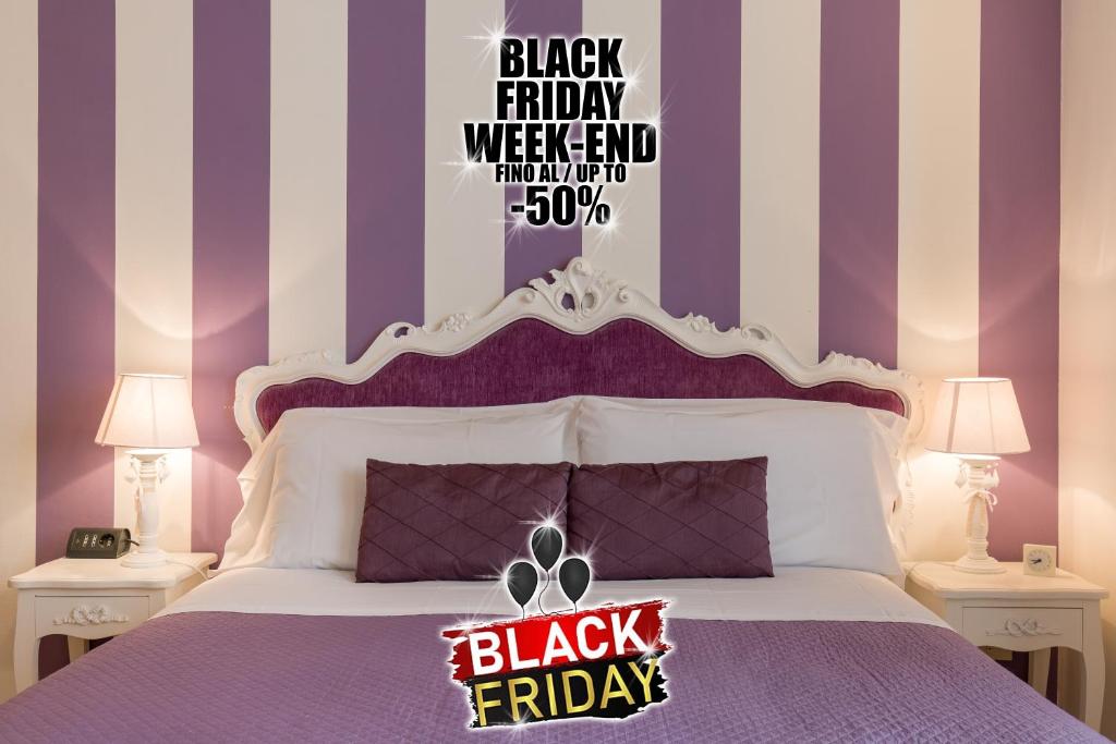 Postel nebo postele na pokoji v ubytování Giardino Giusti House & Court