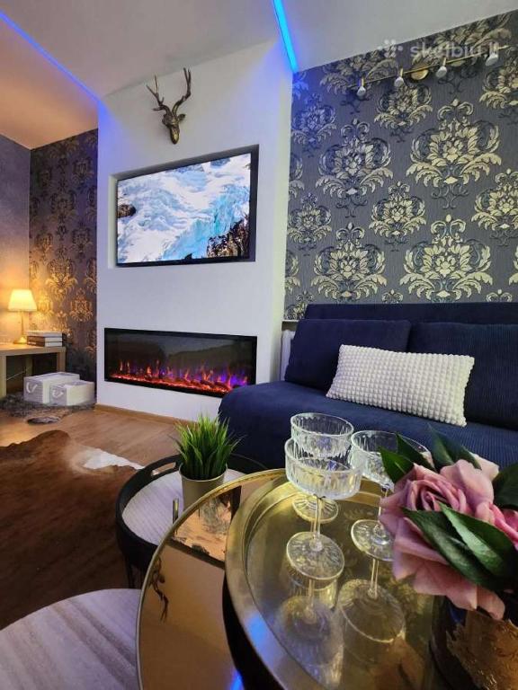 Μια τηλεόραση ή/και κέντρο ψυχαγωγίας στο Žalgirio 1buto apartamentai